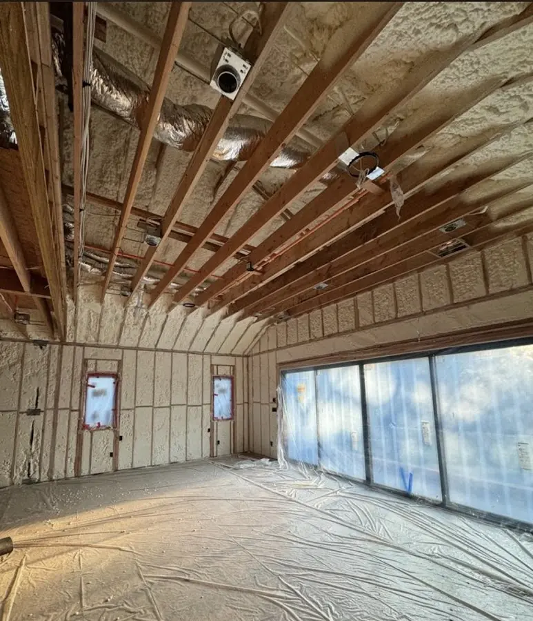 Interior walls and ceiling insulated with spray foam during new construction in Calimesa